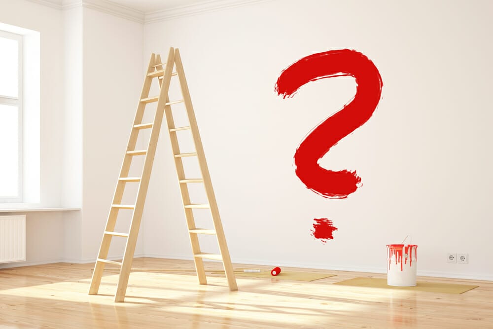 Rood vraagteken op de muur